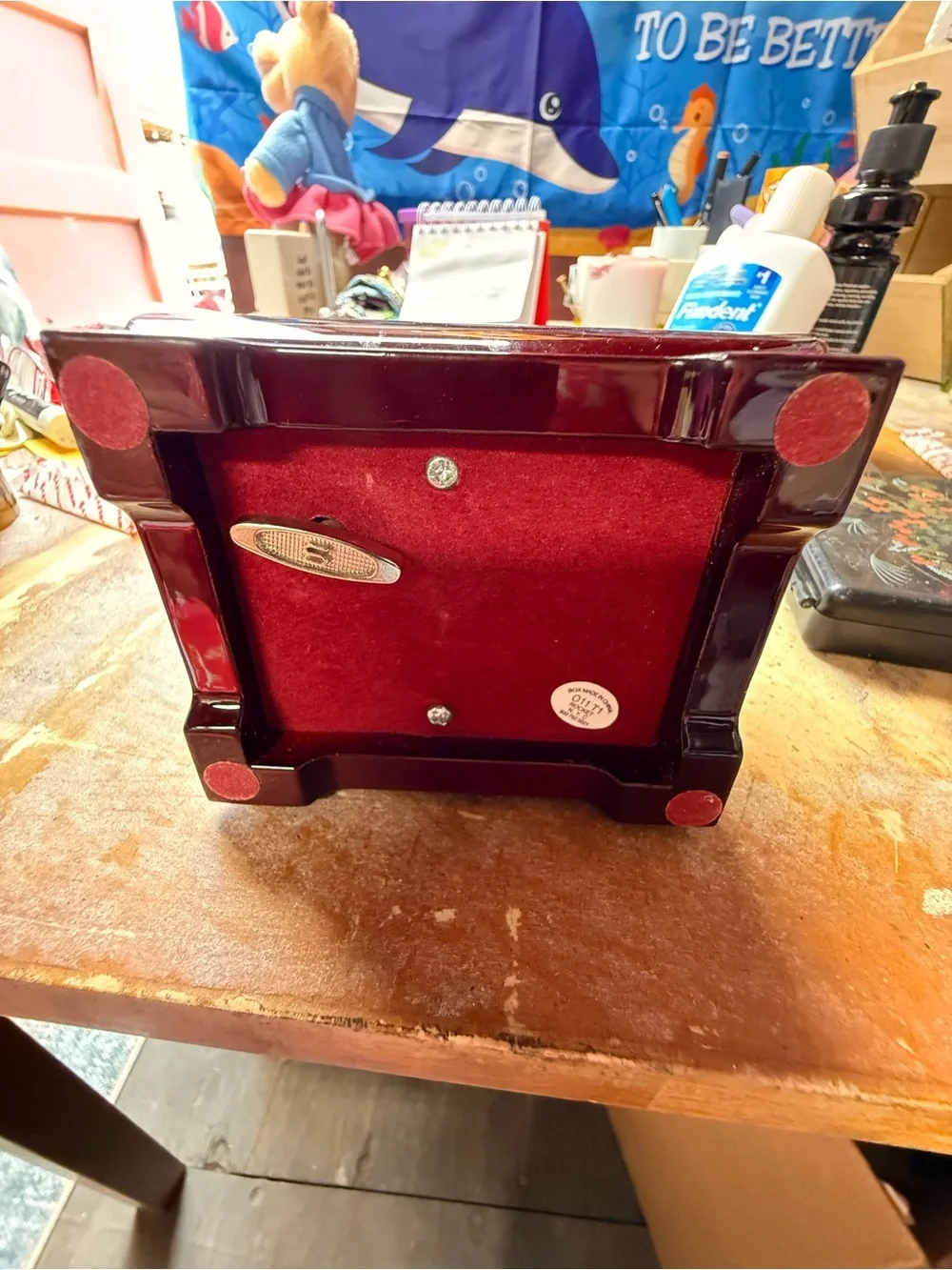 Elegant Dark Red Wooden Jewelry Box with High-Gloss Finish she plays music